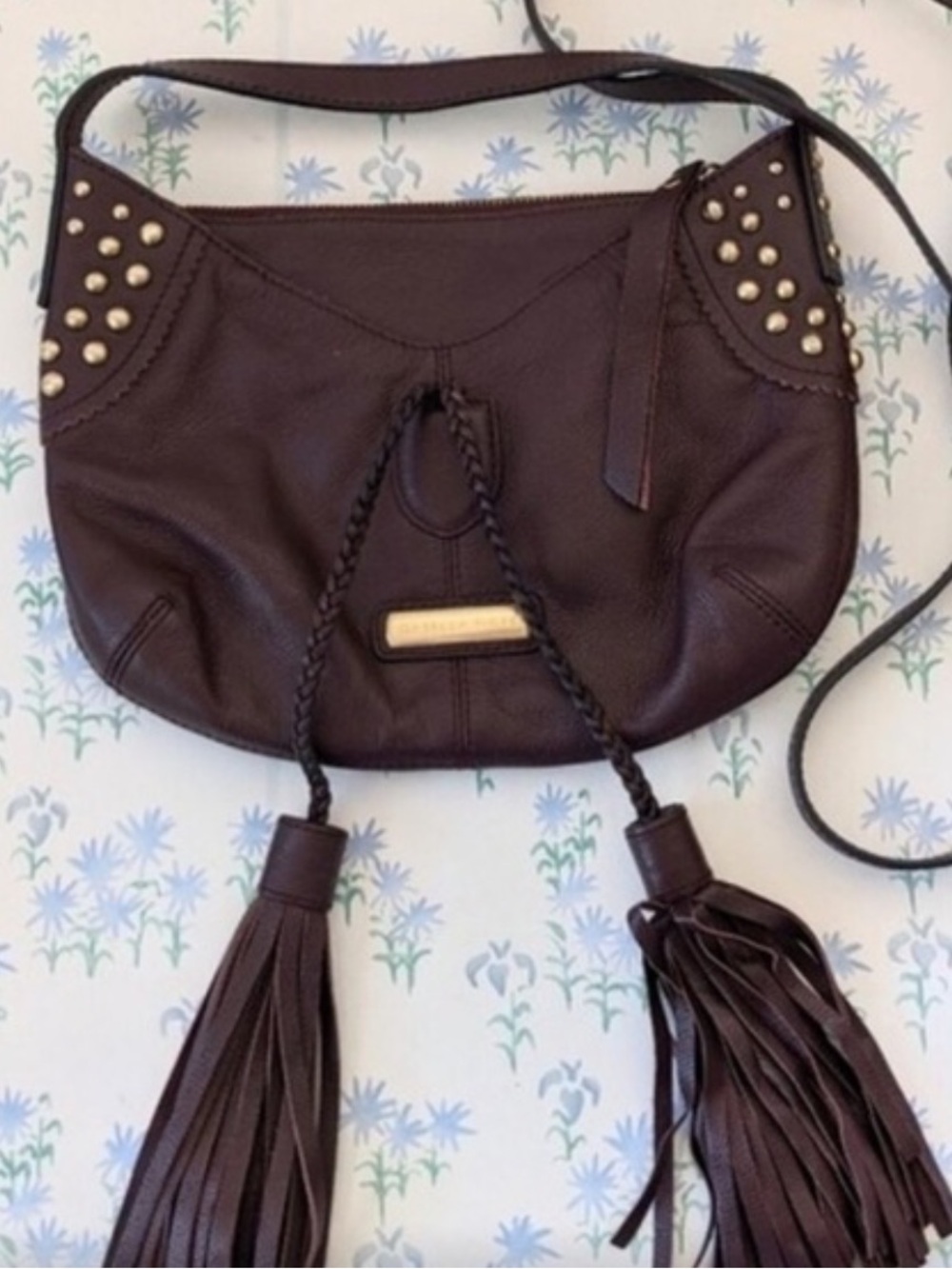 Isabella fiore burgundy tassel studded bag